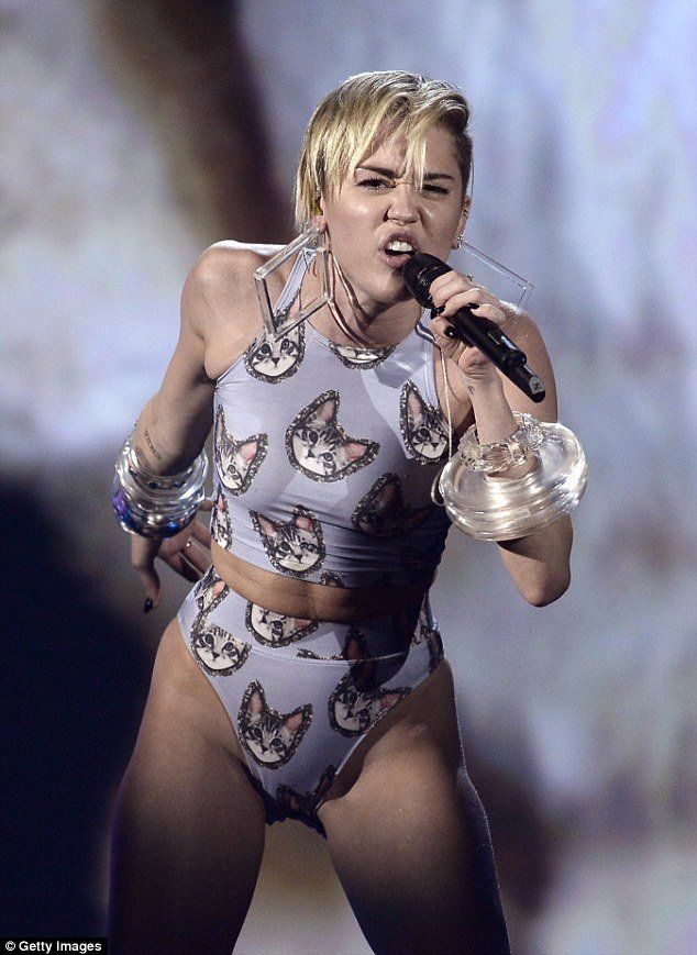 Tinker reccomend Miley cyrus photos too racy g gurls