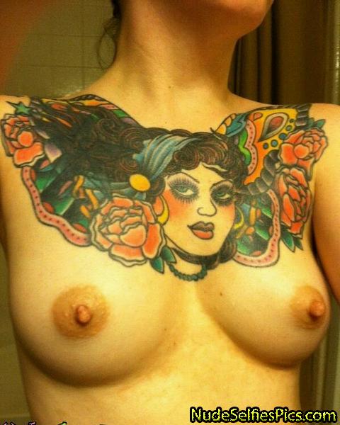 Nude tattoo in the breast