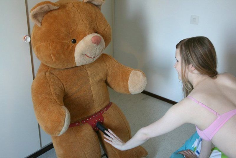 Nude girl with big teddy bear
