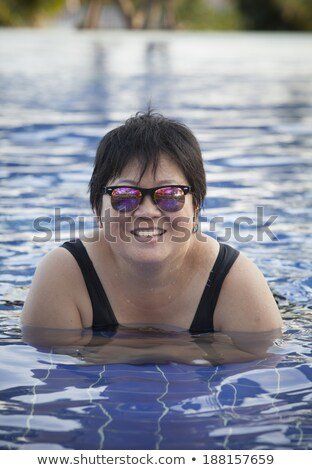 Chubby girl swimming