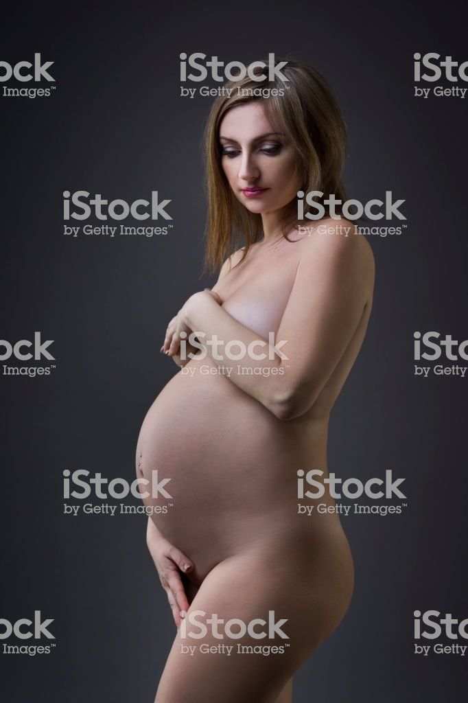Naked pregnant woman photo