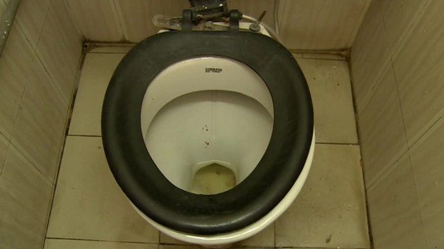 News pissing in toilet
