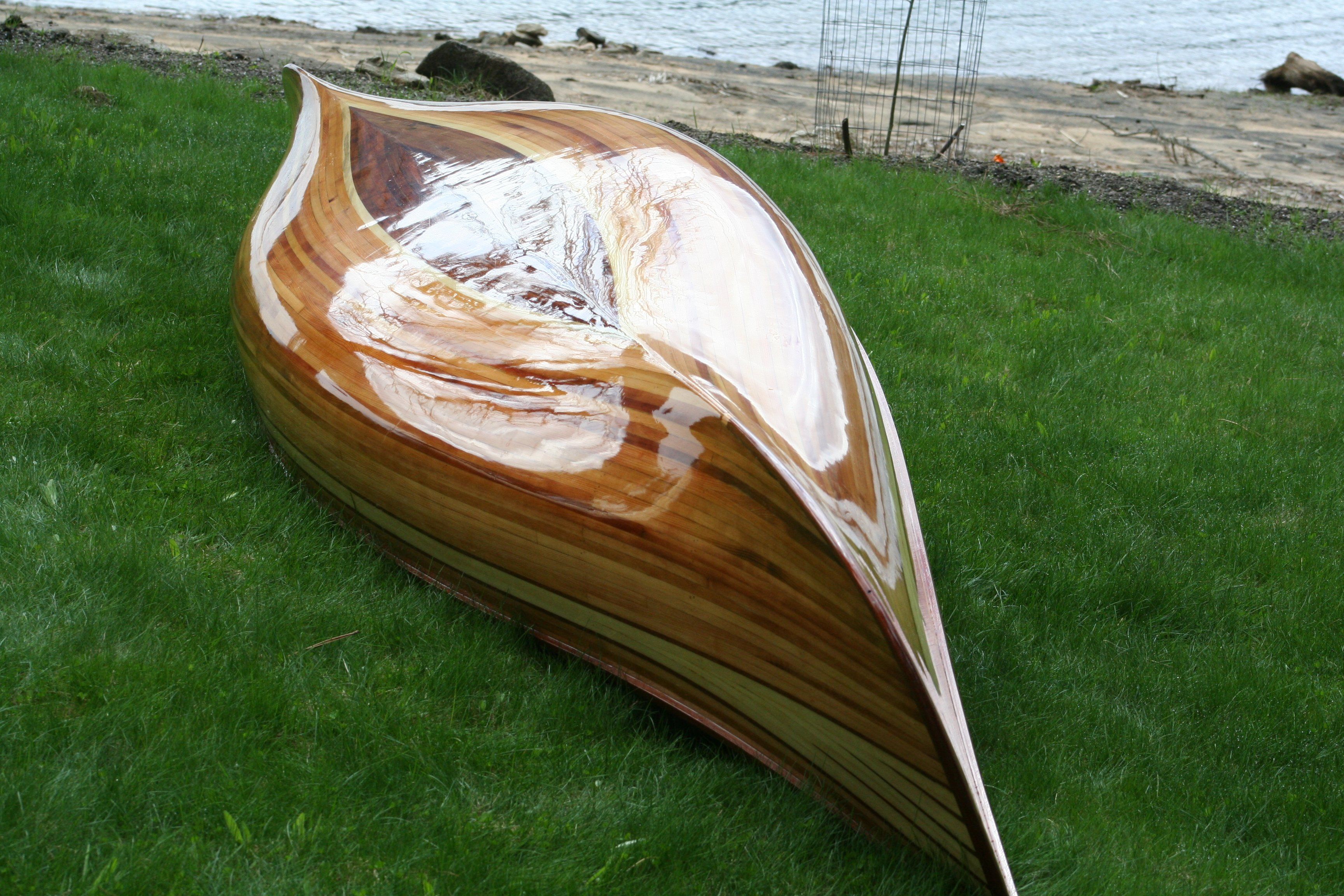 Wooden stripper canoe
